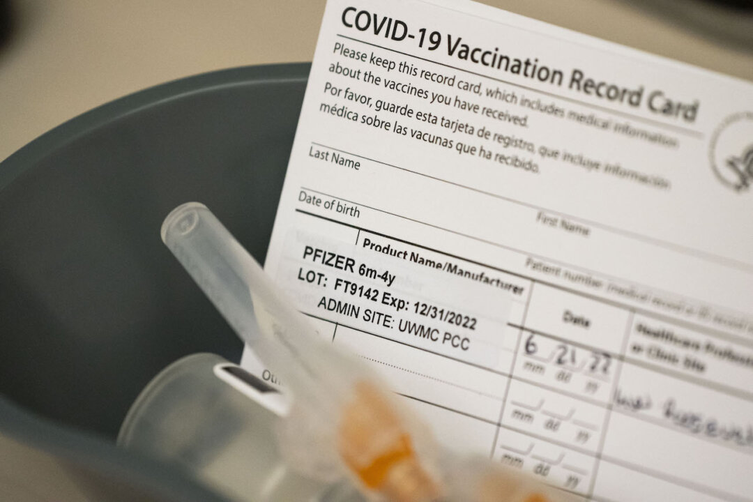 Doses of the Pfizer COVID-19 vaccine and vaccination record cards await pediatric patients at UW Medical Center - Roosevelt in Seattle, Wash., on June 21, 2022. (David Ryder/Getty Images)