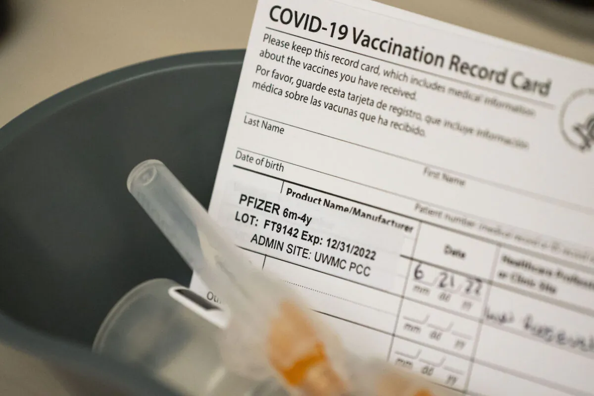 Doses of the Pfizer Covid-19 vaccine and vaccination record cards await pediatric patients at UW Medical Center - Roosevelt in Seattle, Washington, on June 21, 2022. (David Ryder/Getty Images)