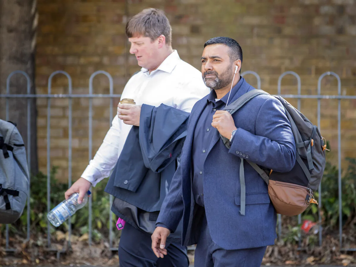 PC Sukhdev Jeer (right) and PC Paul Hefford arriving for a misconduct hearing at Empress State Building, London on July 1, 2022. (PA)
