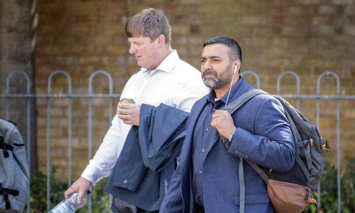 PC Sukhdev Jeer (right) and PC Paul Hefford arriving for a misconduct hearing at Empress State Building, London on July 1, 2022. (PA)