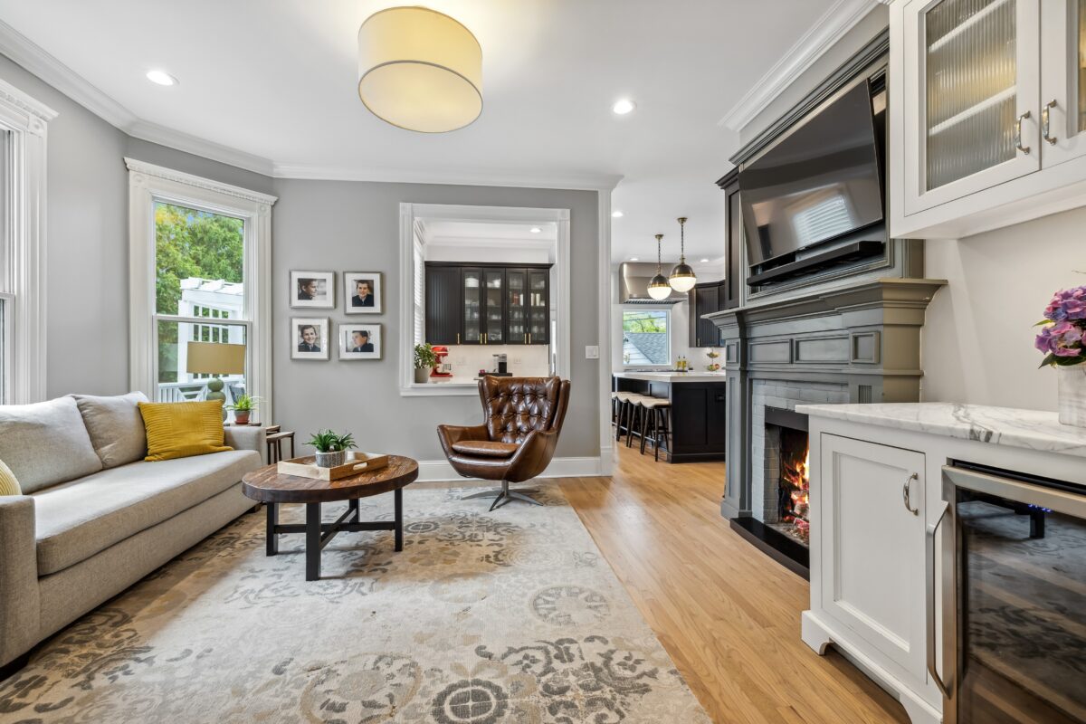 The cozy family room connects effortlessly with the well-equipped kitchen, a welcoming breakfast nook, a formal dining room, and the living spaces on other levels. (Courtesy of Baird & Warner)