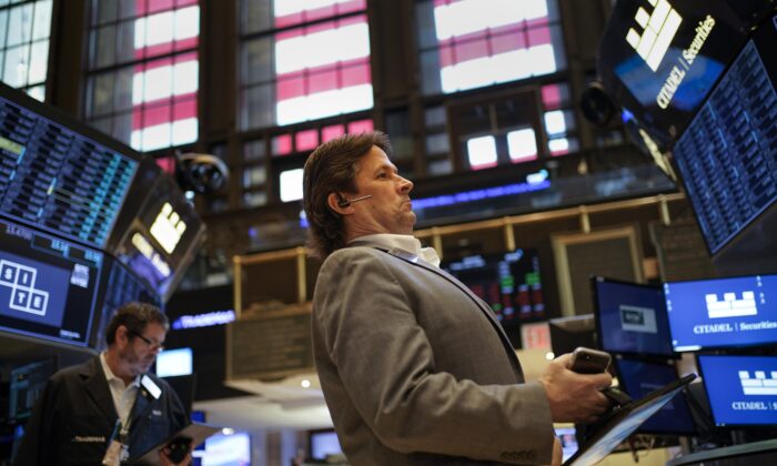 Traders work on the floor at the New York Stock Exchange in New York on July 1, 2022. (Seth Wenig/AP Photo)