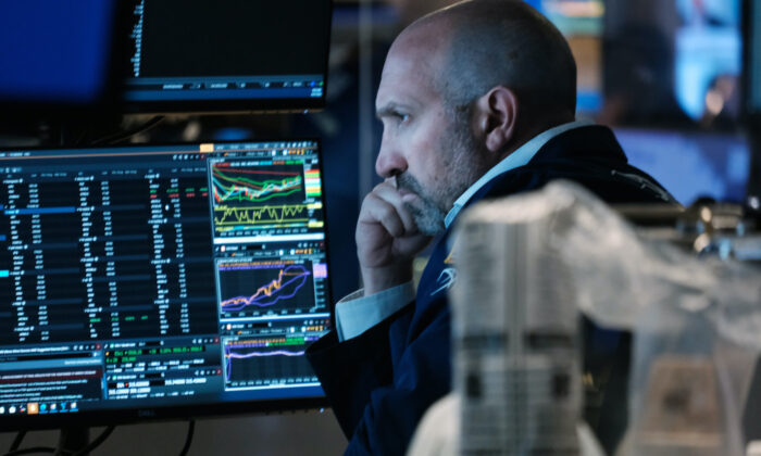 A trader on the floor of the New York Stock Exchange (NYSE) on June 27, 2022. (Spencer Platt/Getty Images)
