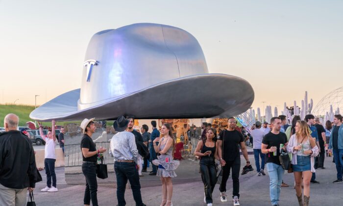 A giant cowboy hat is on display outside the Tesla Giga Texas manufacturing facility during the "Cyber Rodeo" grand opening party on April 7, 2022 in Austin, Texas. (Suzanne Cordeiro/AFP via Getty Images)
