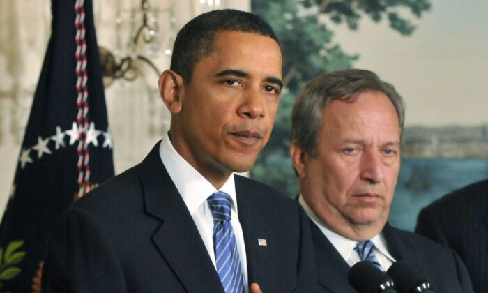 Then-President Barack Obama speaks about the financial crisis responsibility fee in the Diplomatic Reception Room at the White House as Larry Summers looks on in Washington on Jan. 14, 2010. (Ron Sachs-Pool/Getty Images)