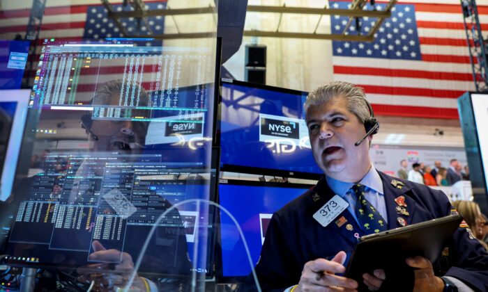 Traders work on the floor of the New York Stock Exchange (NYSE) in New York City on June 30, 2022. (Brendan McDermid/Reuters)