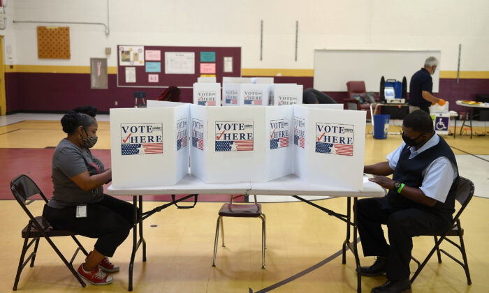 Voters cast their ballots at Keevan Elementary School in North St. Louis, Mo., on Aug. 4, 2020. (Michael B. Thomas/Getty Images)