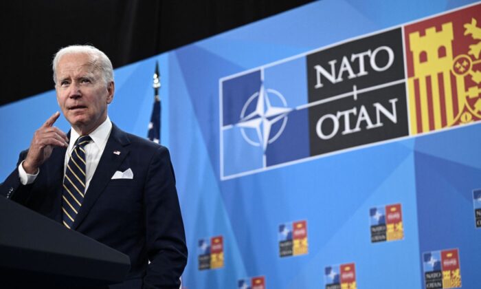 U.S. President Joe Biden gestures as he addresses media representatives during a press conference at the NATO summit in Madrid, on June 30, 2022. (Brendan Smialowski/AFP via Getty Images)