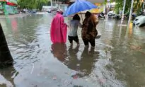 China Lashed by Year’s First Typhoon, Record Rains Forecast