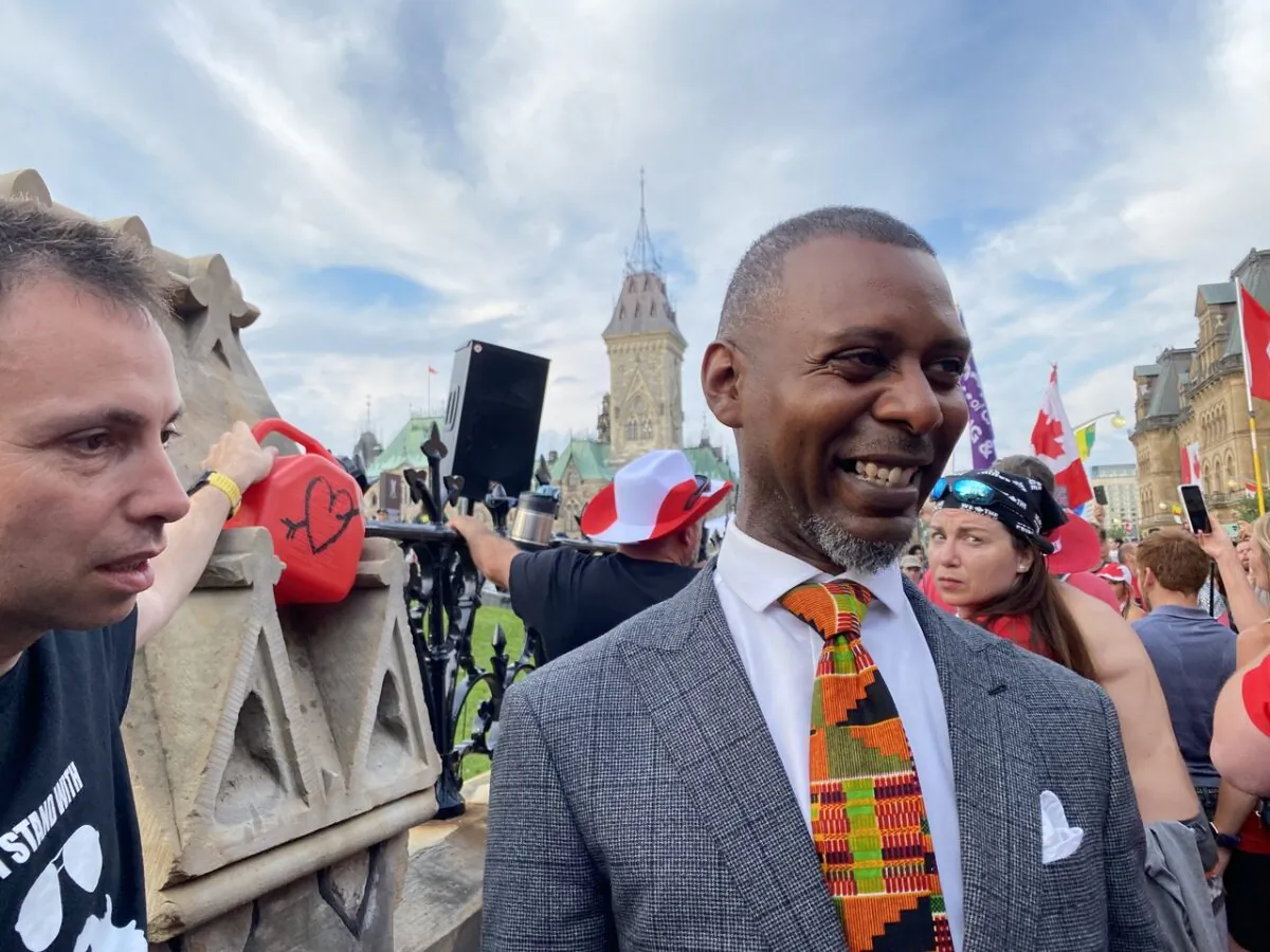 Criminal lawyer Knia Singh (R) on Parliament Hill after giving a speech to a crowd of people protesting against federal COVID-19 vaccine mandates and marking Canada Day on July 1, 2022. (Limin Zhou/The Epoch Times) 