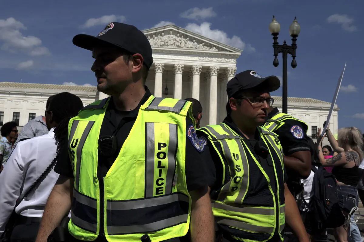 U.S. Capitol Police officers stand in the crowd as protesters gather for a demonstration over the decision overturning Roe v. Wade in front of the U.S. Supreme Court in Washington on June 26, 2022. (Anna Moneymaker/Getty Images)