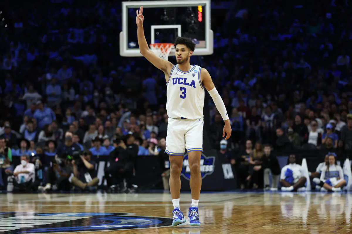 Johnny Juzang (3) of the UCLA Bruins reacts during the second half of the game against the North Carolina Tar Heels in the Sweet Sixteen round game of the 2022 NCAA Men's Basketball Tournament at Wells Fargo Center in Philadelphia on March 25, 2022. (Patrick Smith/Getty Images)