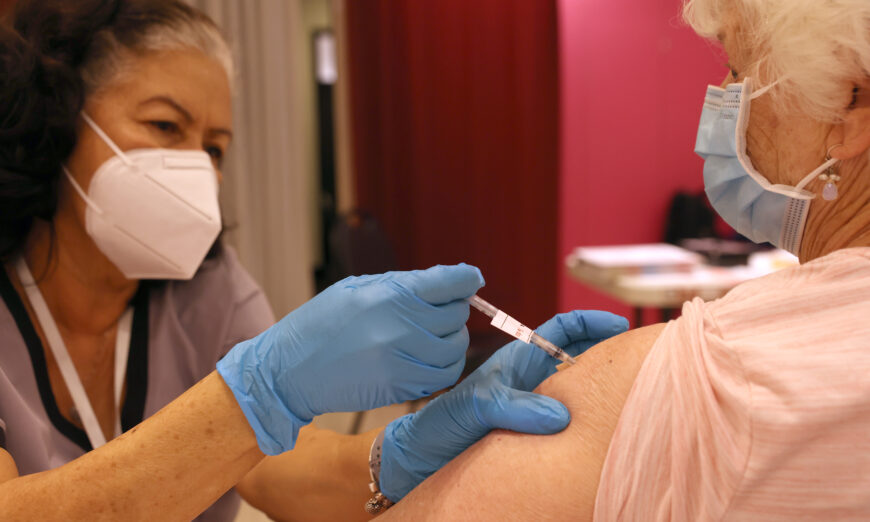 A nurse administers a COVID-19 booster vaccination at a COVID-19 vaccination clinic in San Rafael, Calif., on April 6, 2022. (Justin Sullivan/Getty Images)