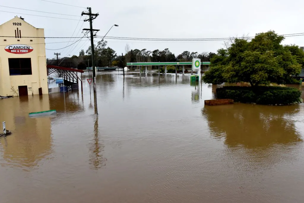 Flooded streets in the Sydney suburb of Camden on July 3, 2022. (Photo by MUHAMMAD FAROOQ/AFP via Getty Images)