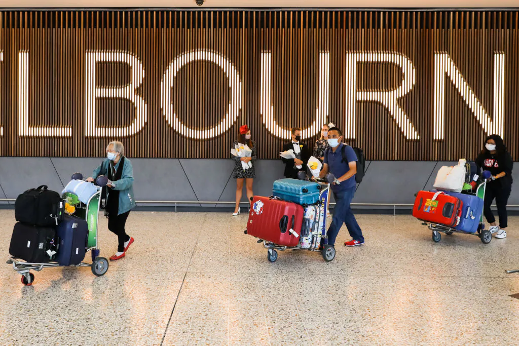 Arrived international travellers walk through the Melbourne Airport International arrivals hall in Melbourne, Australia, on Nov. 1, 2021. (Asanka Ratnayake/Getty Images)