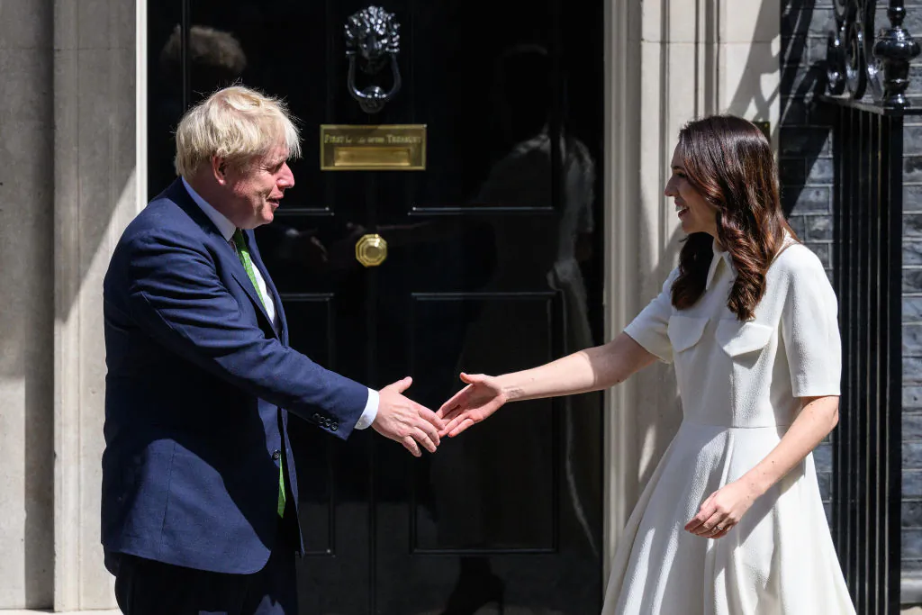 New Zealand's Prime Minister Jacinda Ardern (R) is greeted by her British counterpart Boris Johnson as she arrives for a meeting at Downing Street in London, England, on July 1, 2022. (Leon Neal/Getty Images)