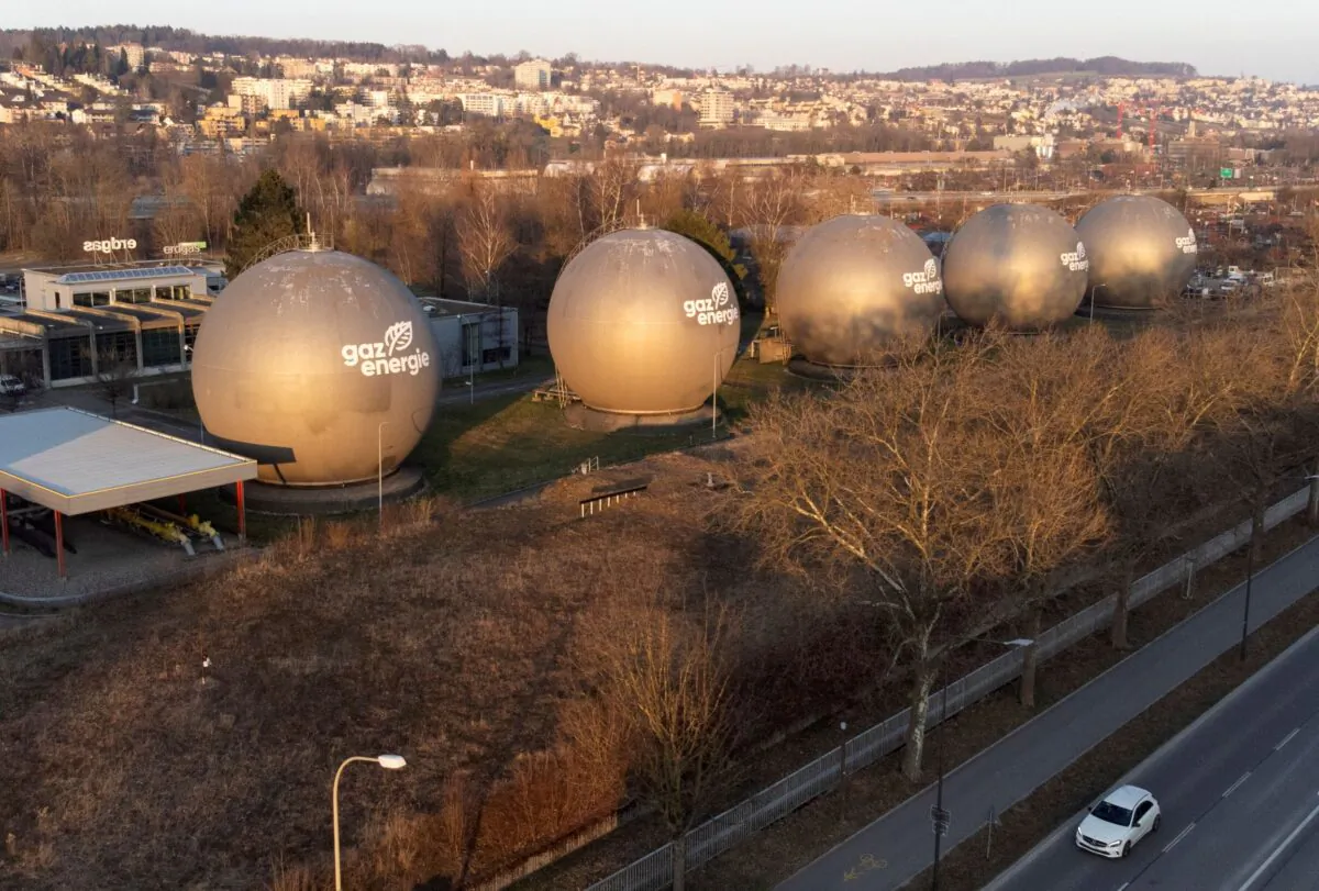 Tanks containing natural gas are seen at a storage facility of Erdgas Ostschweiz AG company in Schlieren, Switzerland, on March 5, 2022. Picture taken with a drone. (Arnd Wiegmann/Reuters)
