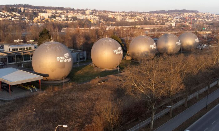 Tanks containing natural gas are seen at a storage facility of Erdgas Ostschweiz AG company in Schlieren, Switzerland, on March 5, 2022. Picture taken with a drone. (Arnd Wiegmann/Reuters)