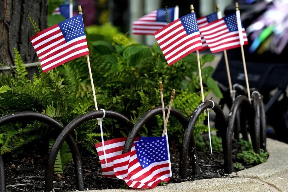 American flags after a mass shooting at the Highland Park Fourth of July parade in downtown Highland Park, Ill., a Chicago suburb, on July 4, 2022. (Nam Y. Huh/AP Photo)
