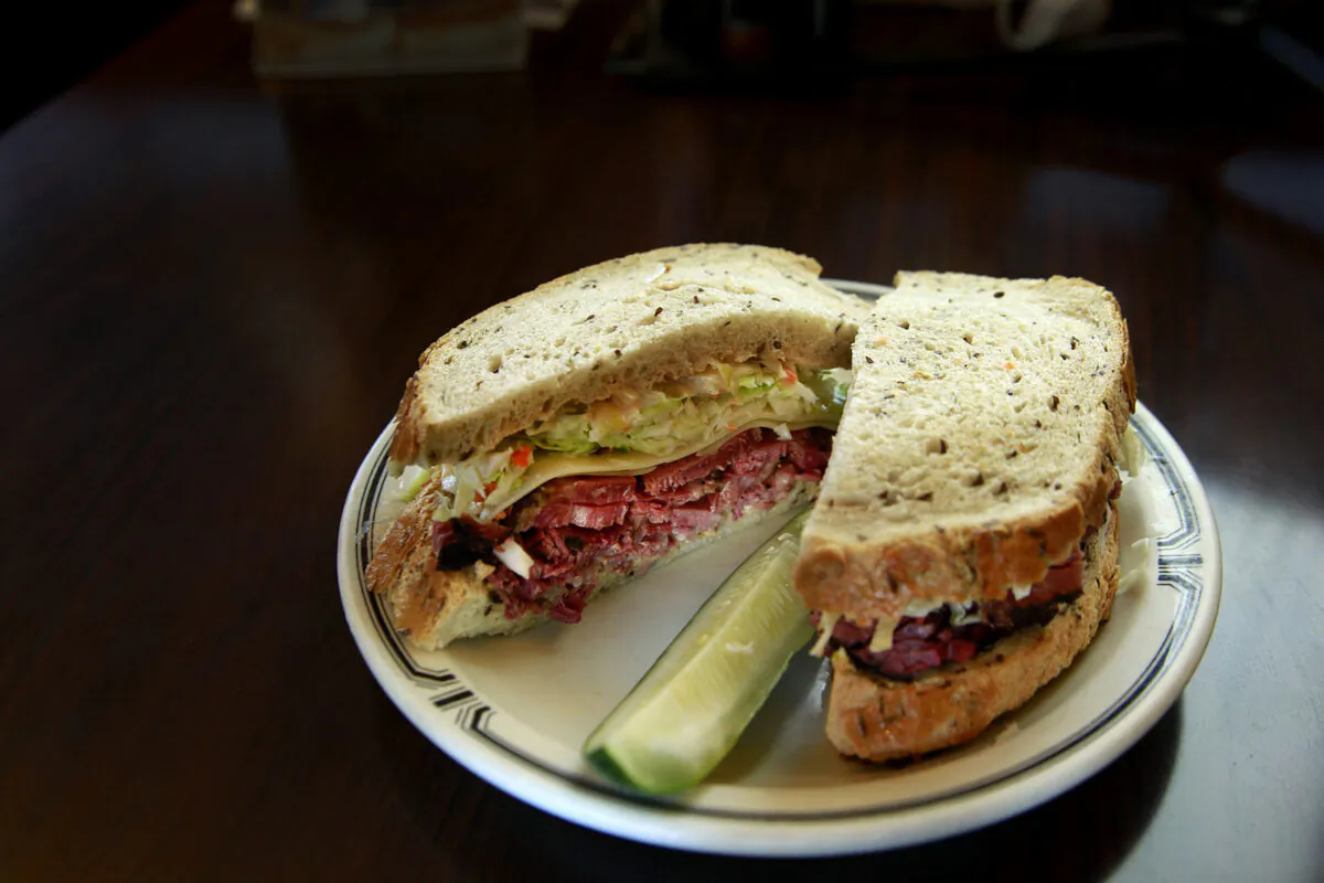 Pastrami and Swiss cheese with cole slaw and Russian style dressing is #19 on Langer's menu, an old-fashioned deli serving up hot pastrami sandwiches and other traditional comfort food since 1947. (Kirk McKoy/Los Angeles Times/TNS)