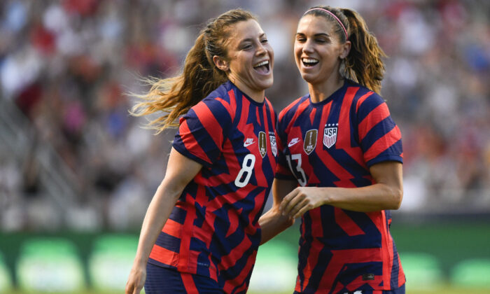 Sofia Huerta #8 and Alex Morgan #13 of the United States celebrate a goal during a game against Columbia at Rio Tinto Stadium, in Sandy, Utah, on June 28, 2022. (Alex Goodlett/Getty Images)