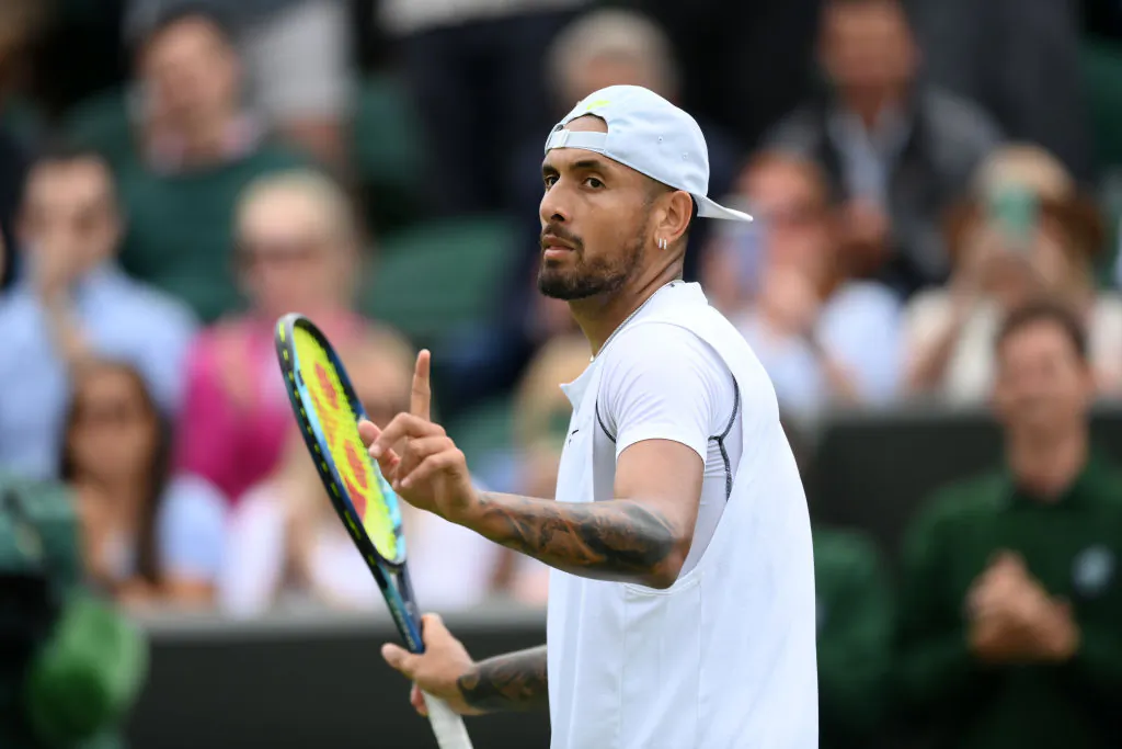 Nick Kyrgios of Australia celebrates winning match point against Filip Krajinovic of Serbia during their Men's Singles Second Round match on day four of The Championships Wimbledon 2022 in London, England, on June 30, 2022. (Shaun Botterill/Getty Images)