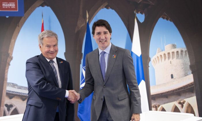 Prime Minister Justin Trudeau meets with Finland President Sauli Niinisto at the NATO Summit in Madrid on June 29, 2022. (The Canadian Press/Paul Chiasson)