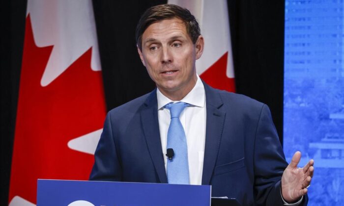 Patrick Brown gestures at the Conservative Party of Canada English leadership debate in Edmonton on May 11, 2022. (Jeff McIntosh/The Canadian Press)