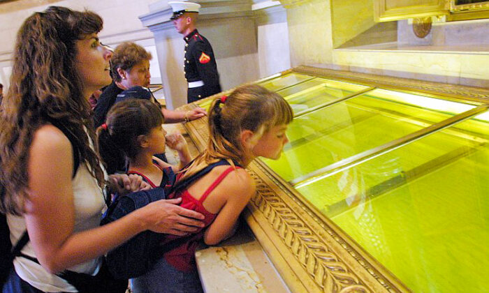 Visitors look at the original copies of the Declaration of Independence, the Constitution, and the Bill of Rights at the National Archives in Washington in this file photo. (Alex Wong/Getty Images)