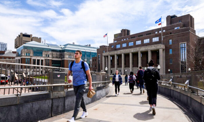 A pedestrian passes by on the University of Minnesota campus in Minneapolis on April 9, 2019. The university closed its Confucius Institute in 2019. (Stephen Maturen/Getty Images)