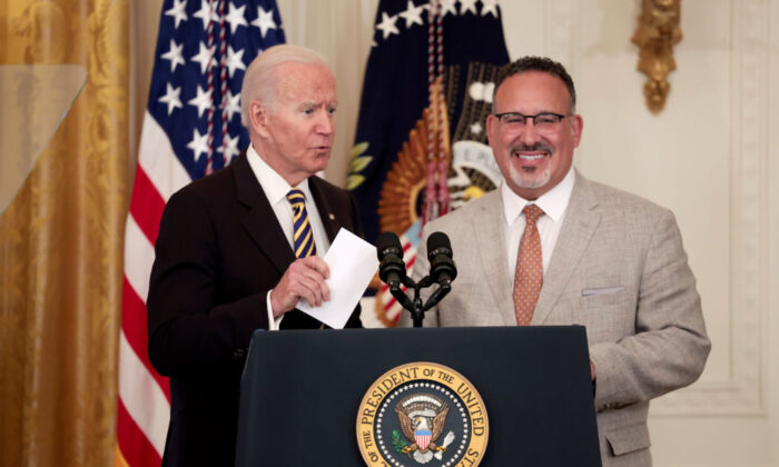 U.S. President Joe Biden and U.S. Education Secretary Miguel Cardona deliver remarks during an event for the 2022 National and State Teachers of the Year at the White House on Apr. 27, 2022. (Anna Moneymaker/Getty Images)