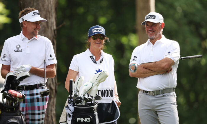 Lee Westwood of England pictured with his wife Helena and Ian Poulter of England during the LIV Invitational at The Centurion Club, in St Albans, England, on June 10, 2022. (Matthew Lewis/Getty Images)