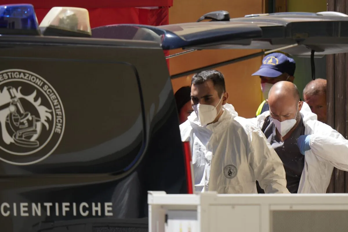 Italian Carabinieri police officers arrive at Canazei, in the Italian Alps to investigate over an avalanche that broke loose from the Punta Rocca glacier sending tons of ice, snow, and rocks onto hikers in northern Italy, on July 6, 2022. (Luca Bruno/AP Photo)
