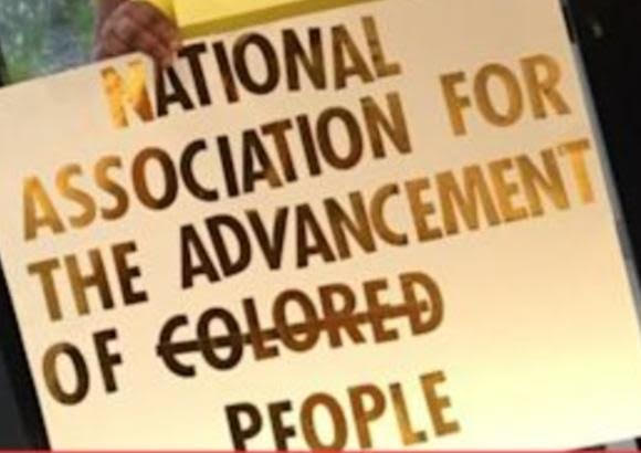 A sign held by Delia Gray as part of her 5-year "one woman crusade" to get the National Association for the Advancement of Colored People to remove the "C" from the organization's name. (Courtesy of Delia Gray)