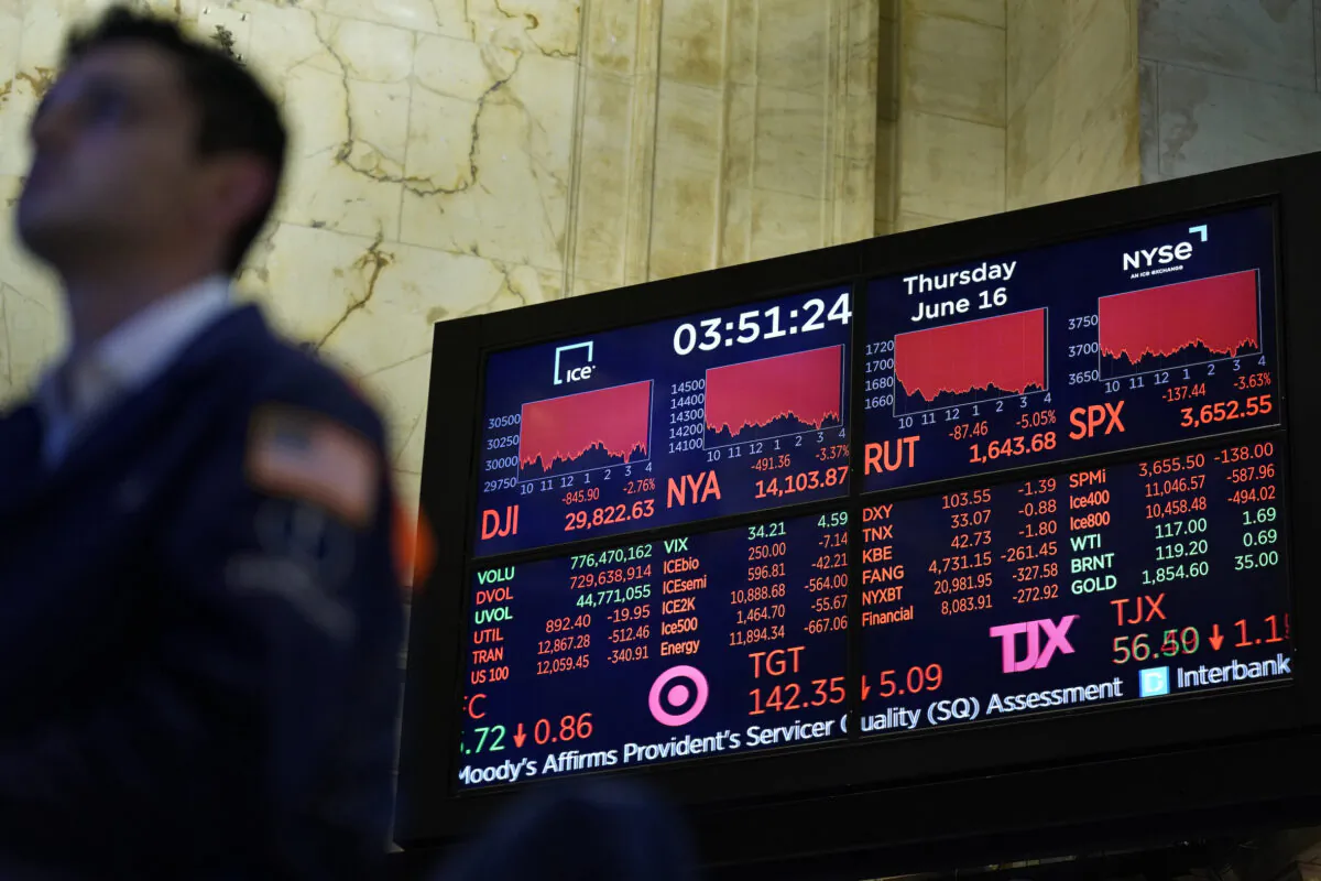 A screen at the New York Stock Exchange shows a lot of red, indicating widespread stock market losses, in New York on June 16, 2022. (AP Photo/Seth Wenig)