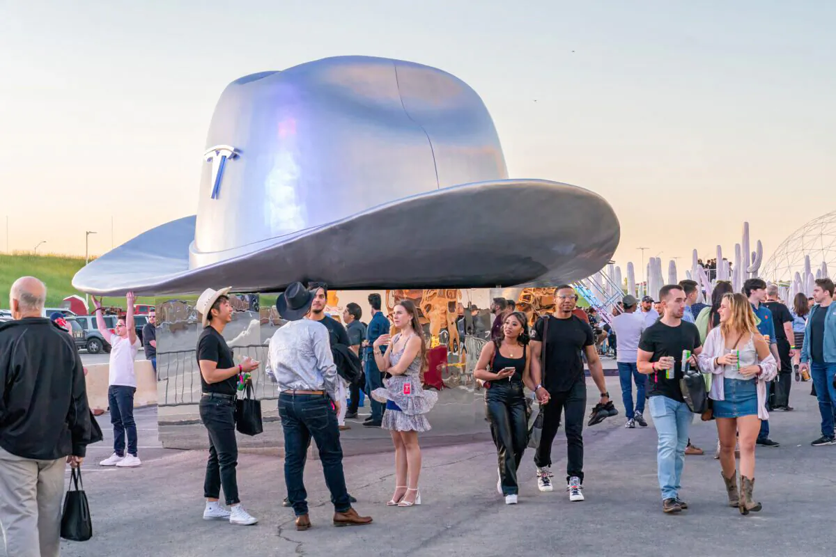 A giant cowboy hat is on display outside the Tesla Giga Texas manufacturing facility during the "Cyber Rodeo" grand opening party on April 7, 2022 in Austin, Texas. (SUZANNE CORDEIRO/AFP via Getty Images)
