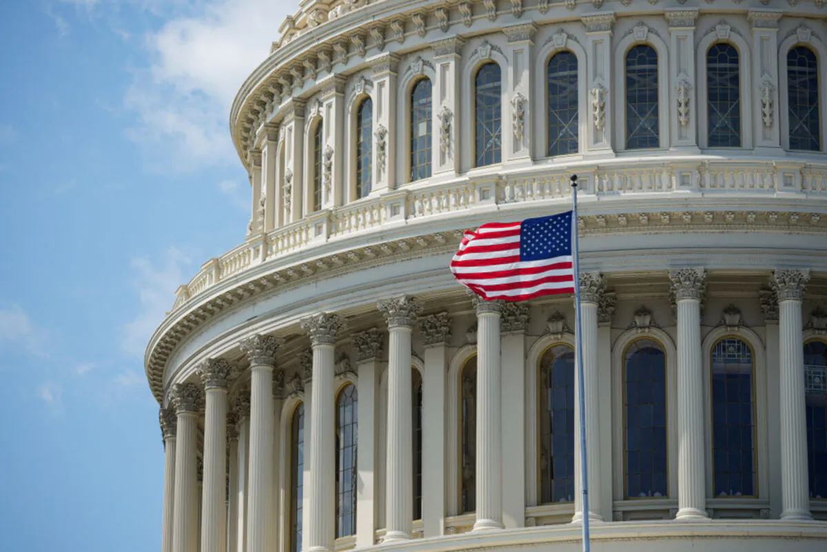 The American flag flies in front of the U.S. Capitol dome on Sept. 10, 2021. (Drew Angerer/Getty Images)