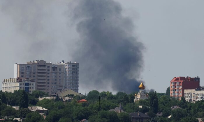 Smoke rises after 
 strikes during Ukraine–Russia conflict in Donetsk, Ukraine, on July 6, 2022. (Alexander Ermochenko/Reuters)
