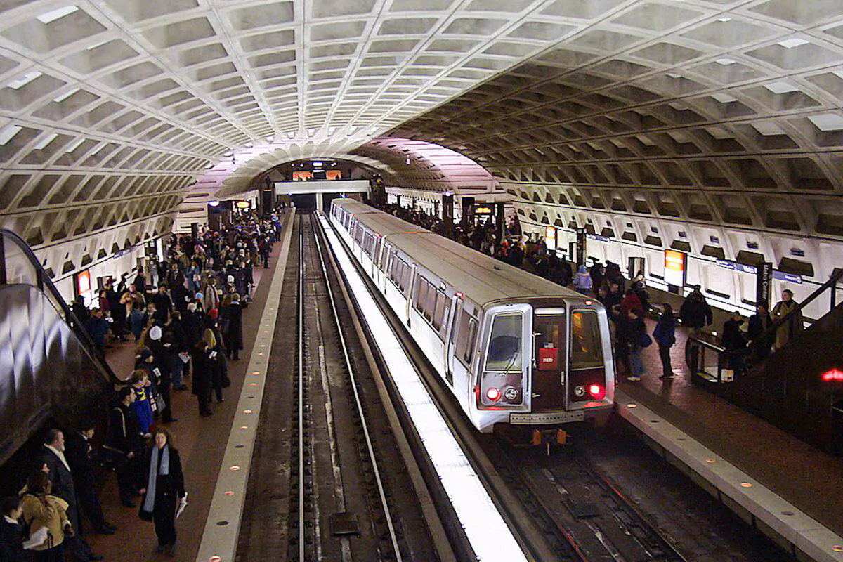 Patrons crowd the platform at the Washington Metropolitan Area Transit Authority's (WMATA) Metro Center stop in Washington, D.C. on Dec. 20, 2004. Thousands use the public transit system daily to get them in and around the D.C. area. 
(Karen Bleier/AFP/Getty Images)