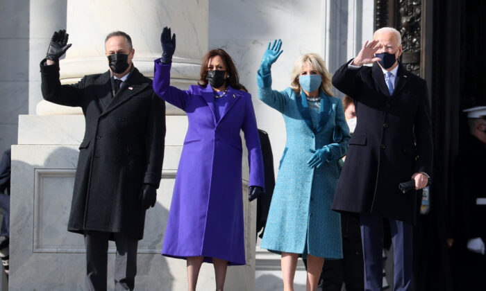 (L-R) Doug Emhoff, Vice President-elect Kamala Harris, Jill Biden, and President-elect Joe Biden wave as they arrive on the East Front of the U.S. Capitol for the inauguration in Washington on Jan. 20, 2021. (Joe Raedle/Getty Images)