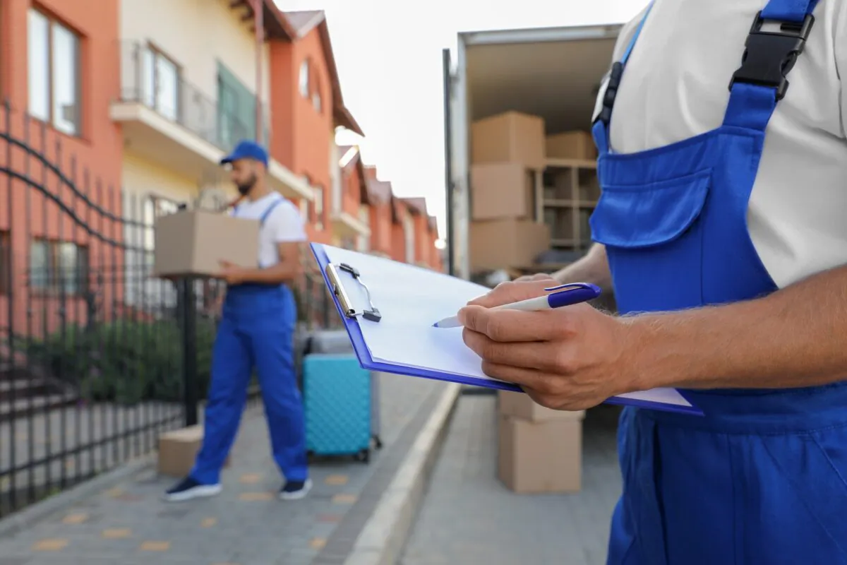 To avoid being scammed, do your research before you sign, and before your goods are on the truck. (New Africa/Shutterstock)