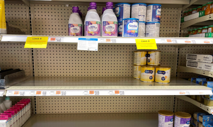 Shelves for baby and toddler formula are partially empty, as the quantity a shopper can buy is limited amid continuing nationwide shortages, at a grocery store in Medford, Mass., on May 17, 2022. (Brian Snyder/Reuters)