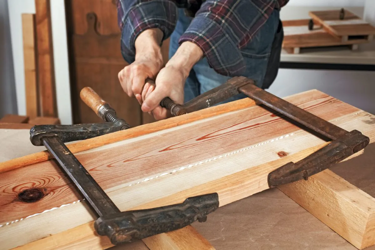 Using glue and clamps provides time to precisely position the pieces for perfect flush joint edges with minimal sanding.(Ingo Bartussek/Shutterstock)