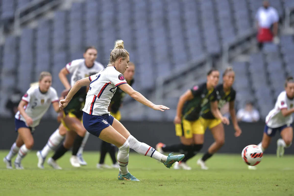 Kristie Mewis of USA kicks a penalty and scores her team's fourth goal during the match between Jamaica and United States as part of the 2022 Concacaf W Championship at BBVA Stadium, in Monterrey, Mexico, on July 07, 2022. (Azael Rodriguez/Getty Images)