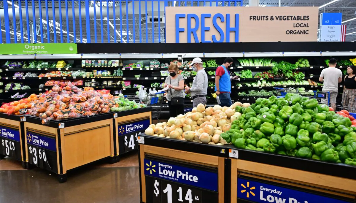 People shop for produce at a store in Rosemead, Calif., on June 28, 2022. (Frederic J. Brown/AFP via Getty Images)