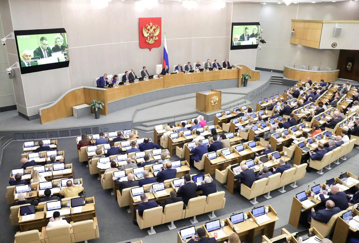 Russian lawmakers attend a session of the State Duma, the lower house of parliament, in Moscow on July 5, 2022. (Russian State Duma/Handout via Reuters)