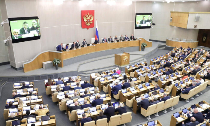 Russian lawmakers attend a session of the State Duma, the lower house of parliament, in Moscow, Russia, on July 5, 2022. (Russian State Duma/Handout via Reuters)
