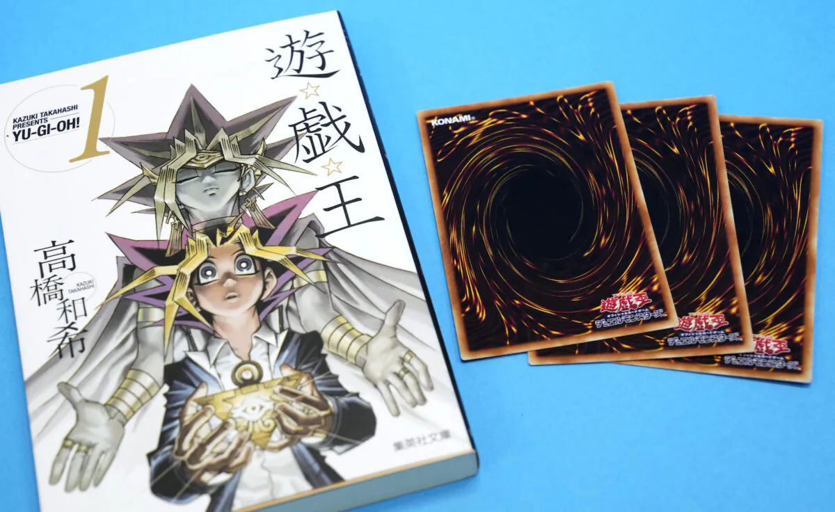 This photo shows “Yu-Gi-Oh!” manga comic and trading cards in Tokyo, Japan, on July 7, 2022. (Shohei Miyano/Kyodo News via AP)