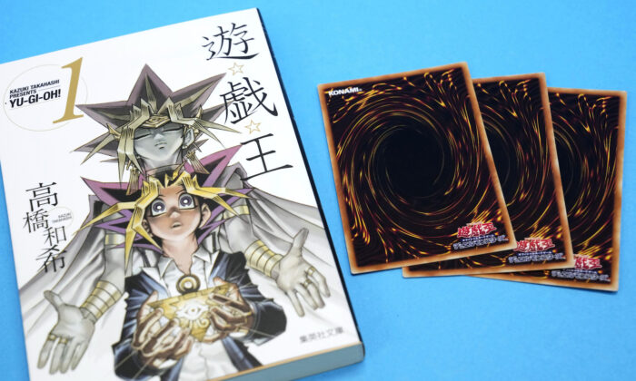 This photo shows “Yu-Gi-Oh!” manga comic and trading cards in Tokyo, Japan, on July 7, 2022. (Shohei Miyano/Kyodo News via AP)