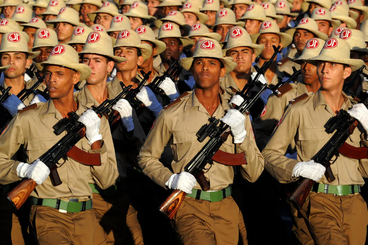 Cuban troops participate in a military parade in honor of former Cuban leader Fidel Castro at Revolution Square in Havana on Jan. 2, 2017. (Yamil Lage/AFP via Getty Images)